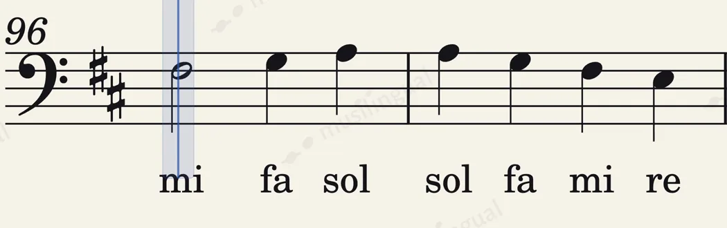 Two bars of Ode to Joy in bass clef, the solfège names mi fa sol, sol fa mi re under the notes, and the blue cursor on the first note.